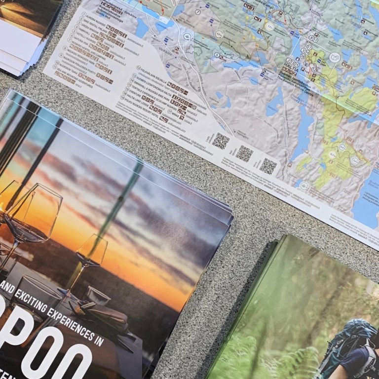 Table with maps and brochures about Espoo's sights