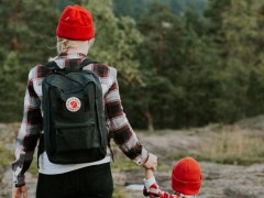 Woman walking with child in nature