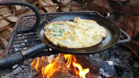 Nettle pancakes by the fire