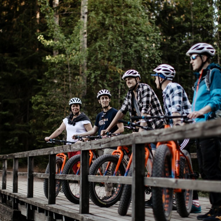 Group of cyclists in Nuuksio National Park