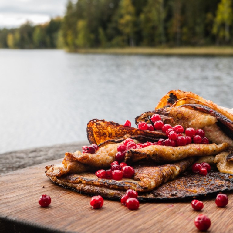 Outdoor made pancakes right next to lake