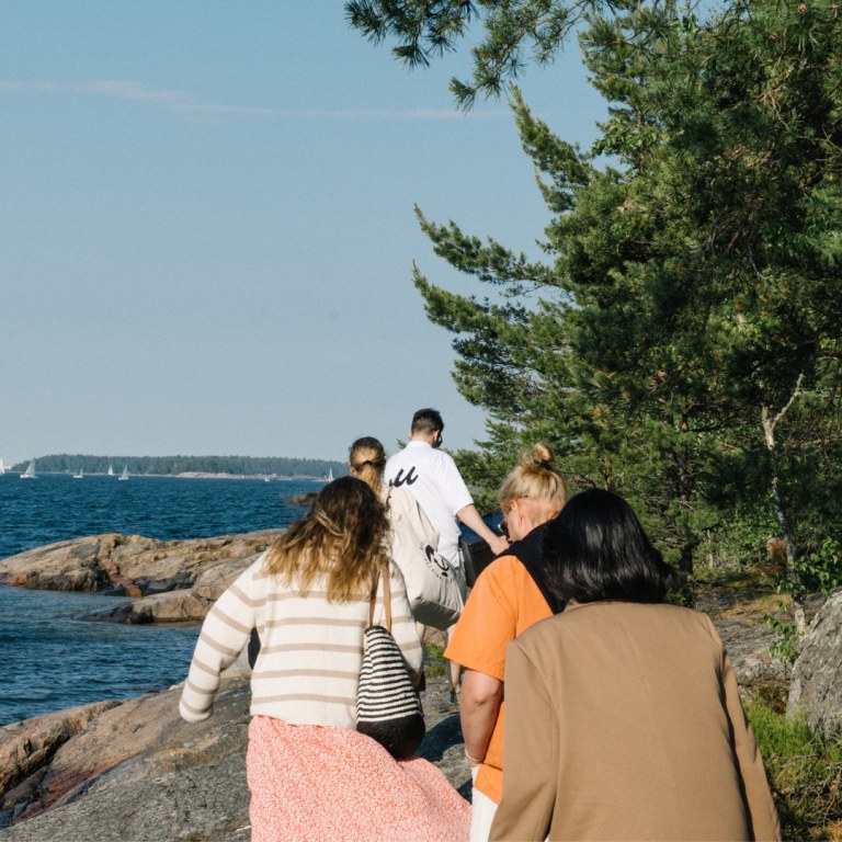 Group walking on Rövaren island