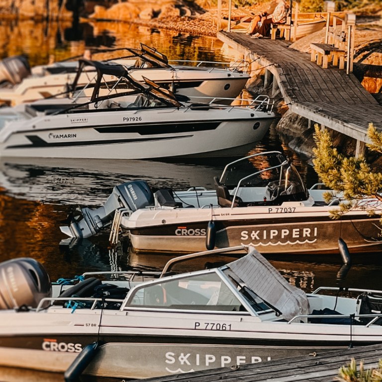 Skipperi boats parked by the deck