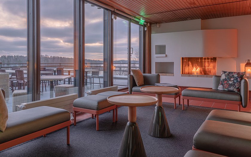 Rooftop room with sofas and fire place