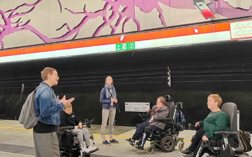 Group of wheelchair tourist with a guide on Metro Guided Tour