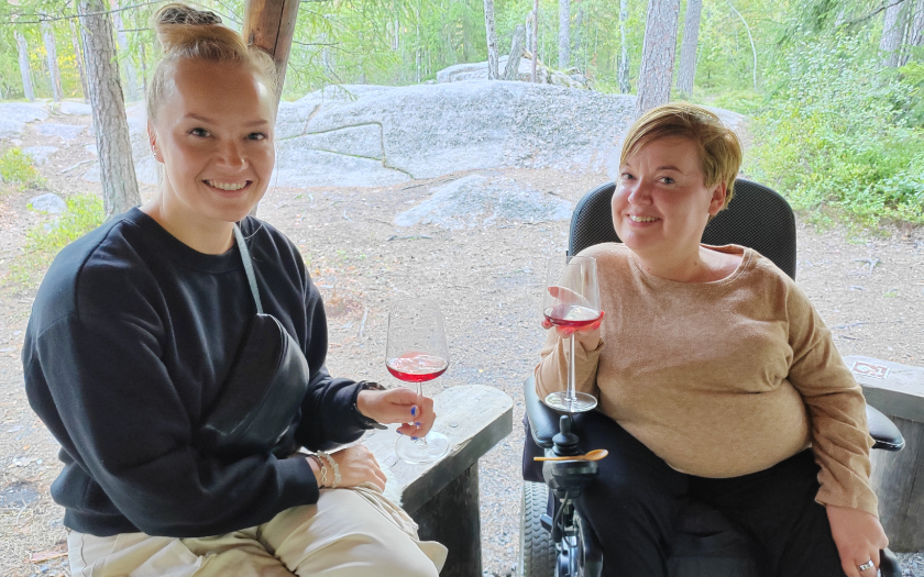 Two woman enjoying Wine in the Woods - wine tasting.