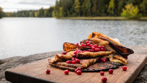 Outdoor made pancakes right next to lake