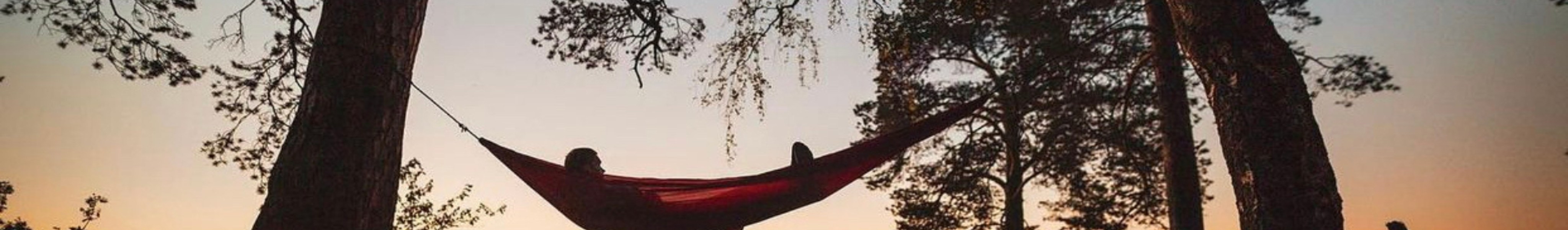 Person in hammock during golden hour